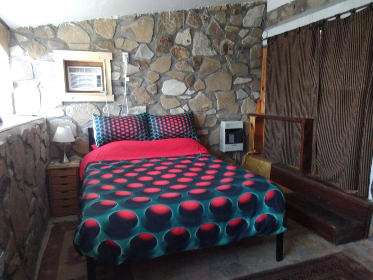 La Loma Del Chivo Llc Stone Cottage Alternative Building Marathon Kültér fotó